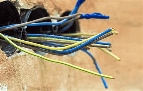 electrical box and wires left open in backyard|exposed wire in yard.